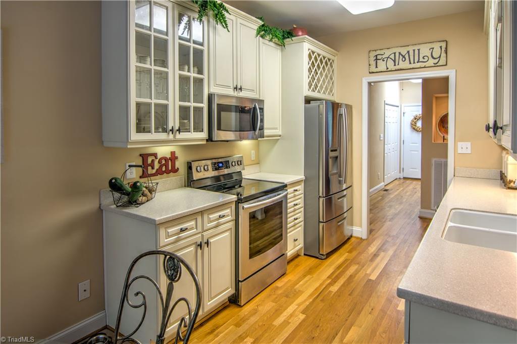 2494 Riverside Drive Lexington, NC 27292 - Photo 10 of 19 Kitchen with microwave, range, dishwasher, refrigerator