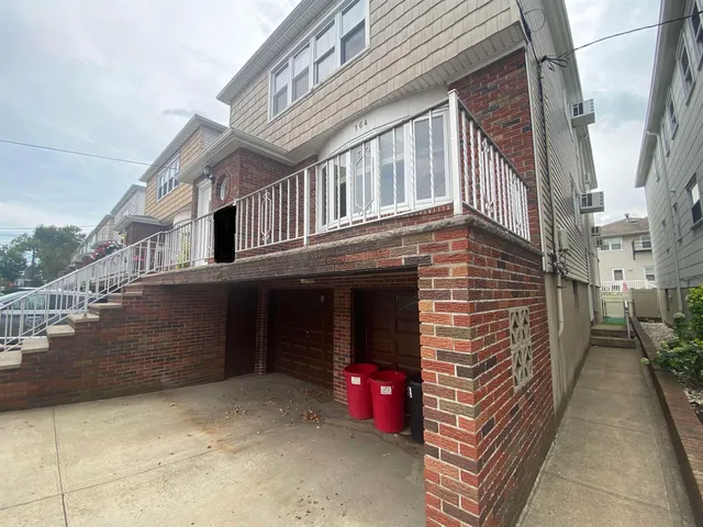 a front view of a house with an outdoor space