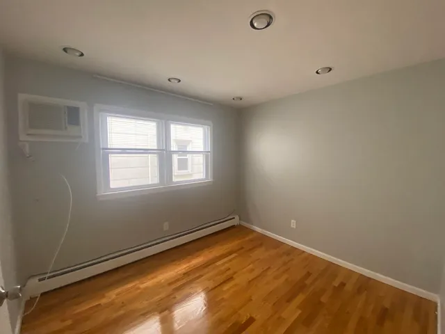 a view of a room with a window