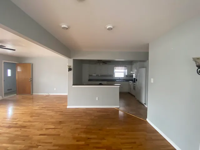 a view of kitchen and kitchen with furniture