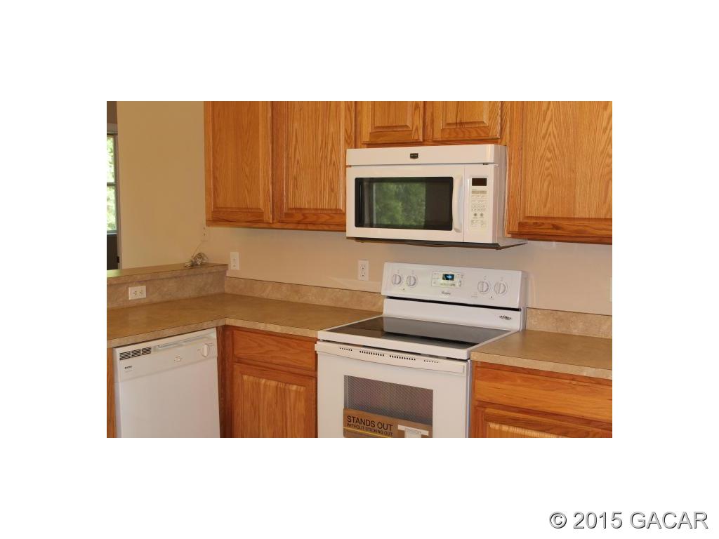 14277 Northwest 9th Road Newberry, FL 32669 - Photo 2 of 16 Kitchen, new stove!