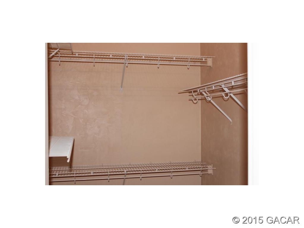 14277 Northwest 9th Road Newberry, FL 32669 - Photo 9 of 16 large master walk -in closet