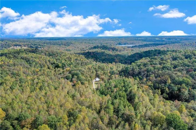 a view of a yard with an outdoor space