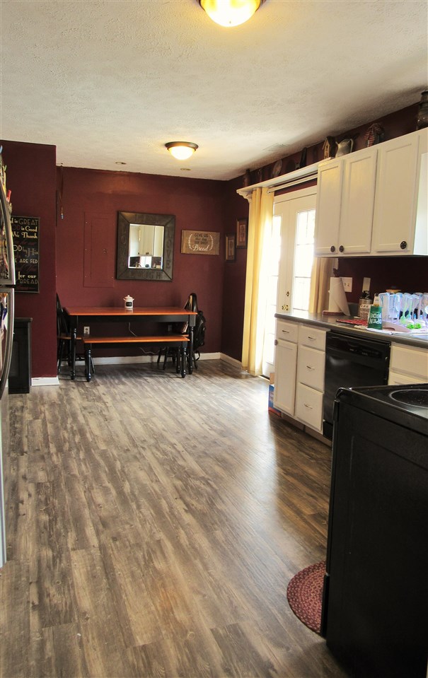 17 Hayrick Road Waynesboro, VA 22980 - Photo 6 of 16 a view of a kitchen with kitchen island wooden floors and stainless steel appliances