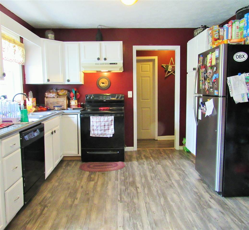 17 Hayrick Road Waynesboro, VA 22980 - Photo 8 of 16 a kitchen with stainless steel appliances granite countertop a refrigerator a stove top oven and a sink