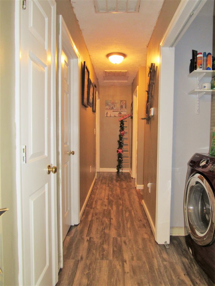17 Hayrick Road Waynesboro, VA 22980 - Photo 10 of 16 a view of a hallway with wooden floor and staircase