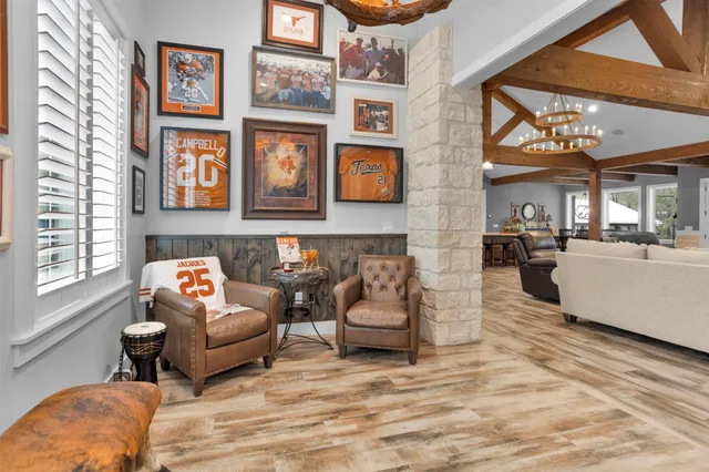 a blue bath tub sitting in a bathroom