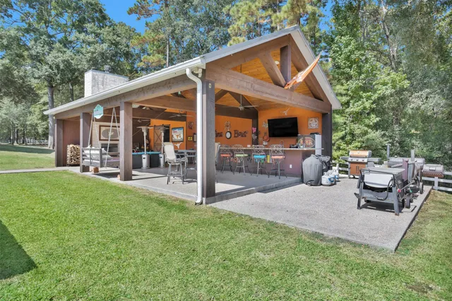 a kitchen with stainless steel appliances a sink stove and cabinets