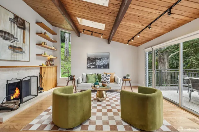 a view of a chairs and table on the deck
