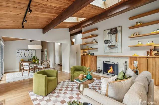 a kitchen with stainless steel appliances a refrigerator sink and stove