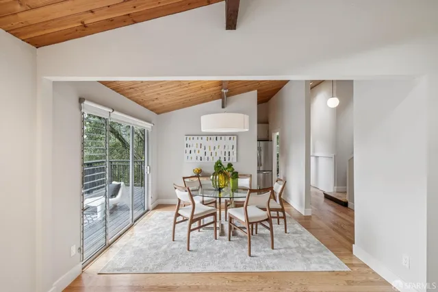 a stove top oven sitting inside of a kitchen
