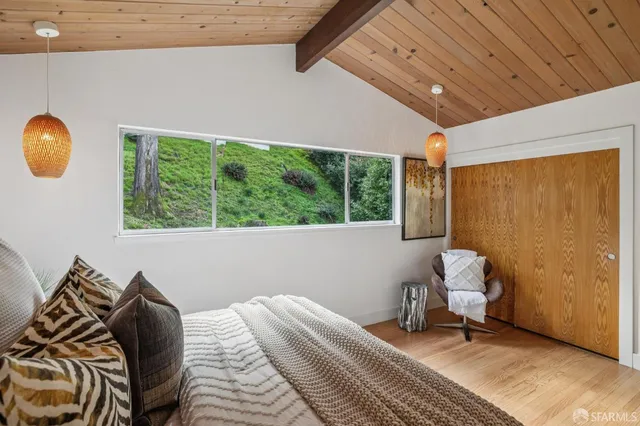 a bathroom with a shower curtain and a bathtub