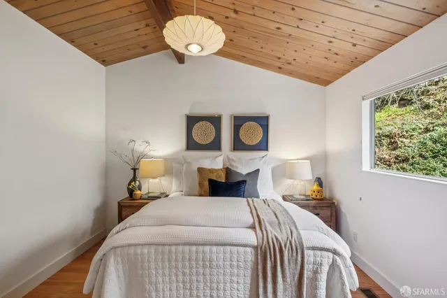 a aerial view of a house with yard and plants