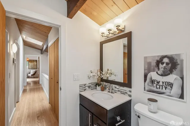 an aerial view of a house with yard