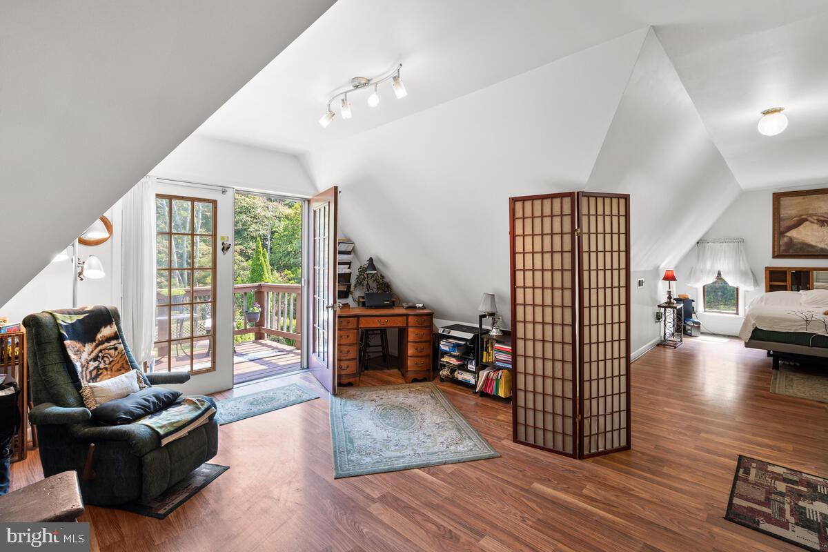 10440 Gambrill Park Road Frederick, MD 21702 - Photo 33 of 72 Upstairs Loft w/doors to deck overlooking pool