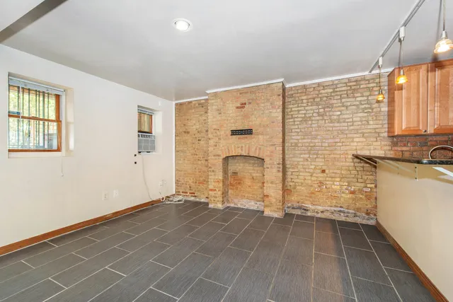 a view of empty room with windows