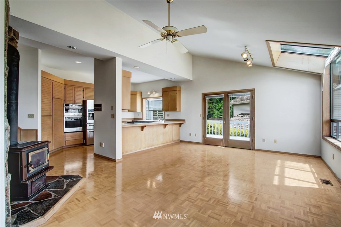6720 139th Place Southwest Edmonds, WA 98026 - Photo 12 of 27 a view of a kitchen with a sink and a stove top oven