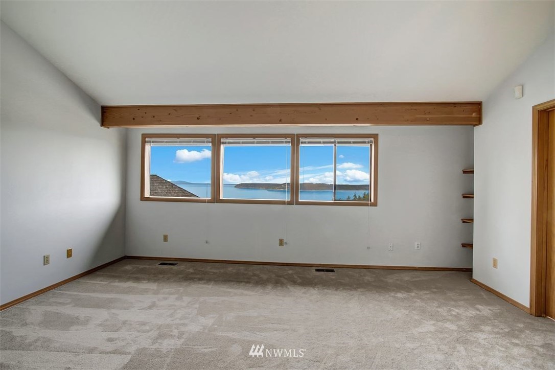 6720 139th Place Southwest Edmonds, WA 98026 - Photo 20 of 27 a view of an empty room with a window