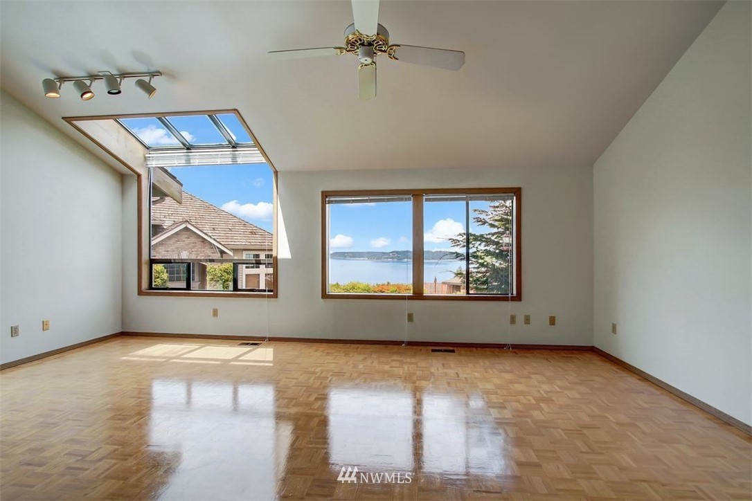 6720 139th Place Southwest Edmonds, WA 98026 - Photo 10 of 27 an empty room with windows