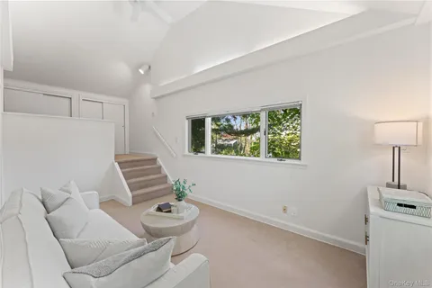 a room with furniture and a window