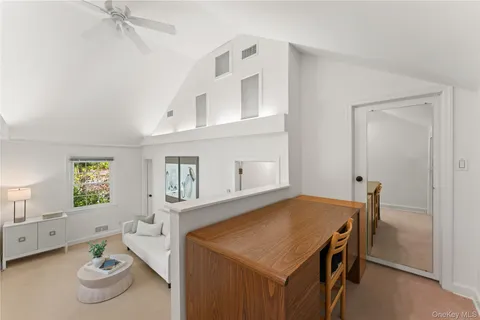 a dining room with a table and chairs
