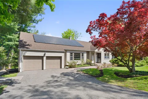 front view of house with a yard