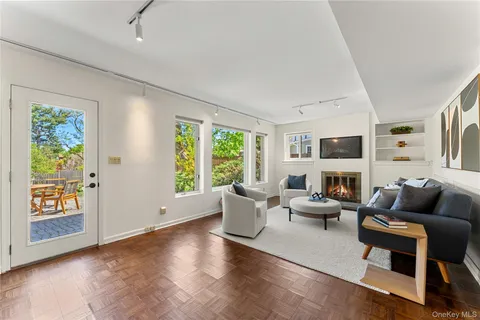 a living room with furniture and a window