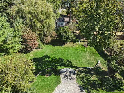a view of a garden with a building