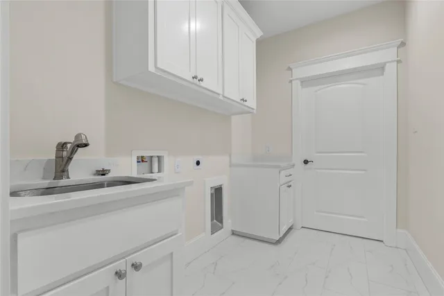 a kitchen with a stove and a microwave oven