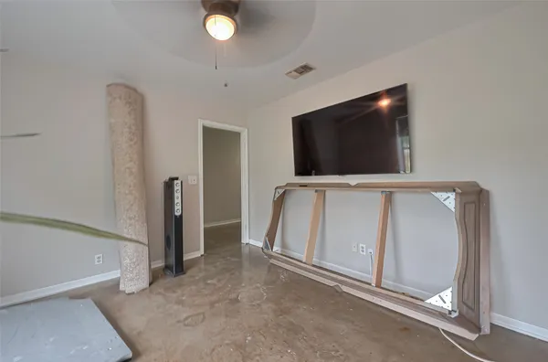 a room with furniture and a window