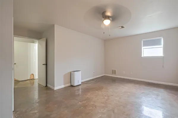 a view of a livingroom with furniture and a couch