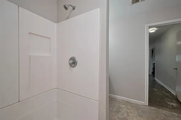 a bathroom with a sink and mirror