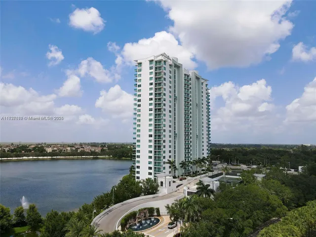 a view of a lake and a yard