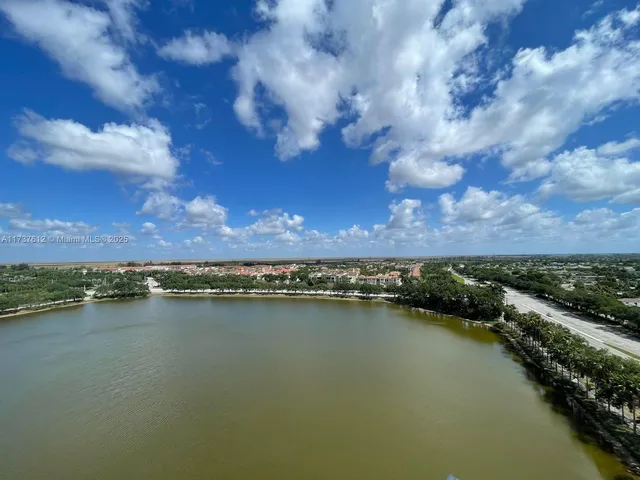 a view of a lake and city