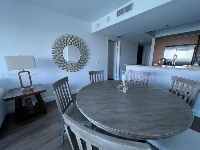 a view of kitchen with dining area