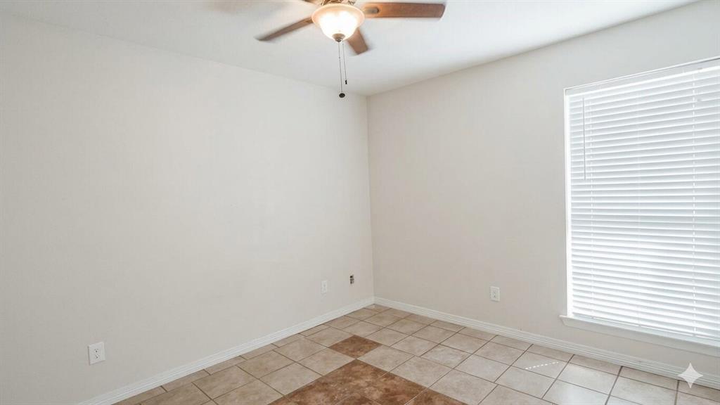 211 Vista Ridge Drive Venus, TX 76084 - Photo 17 of 24 Tile flooring with a decorative inlay