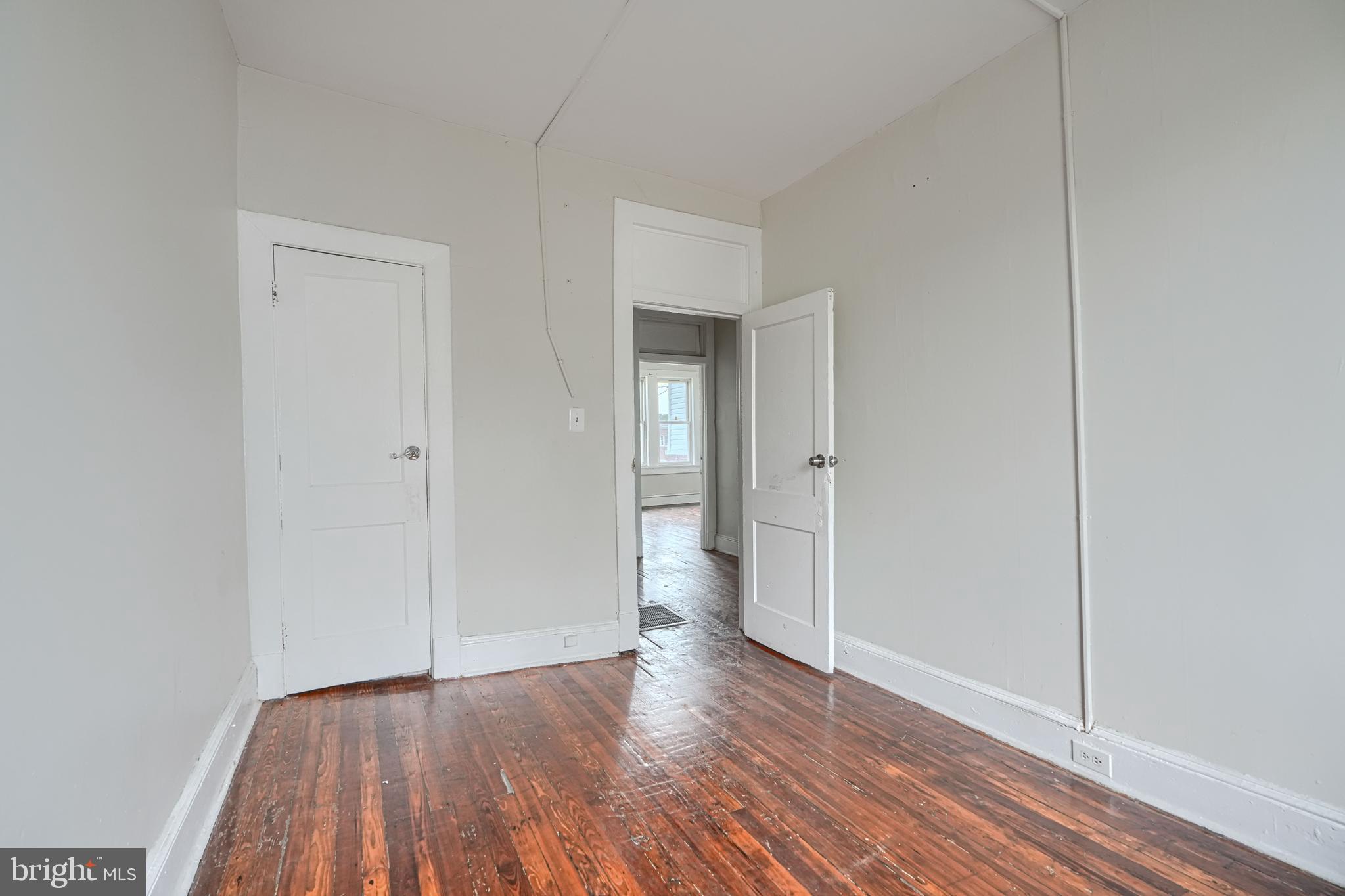 4806 Reisterstown Road Baltimore, MD 21215 - Photo 27 of 34 a view of empty room with wooden floor
