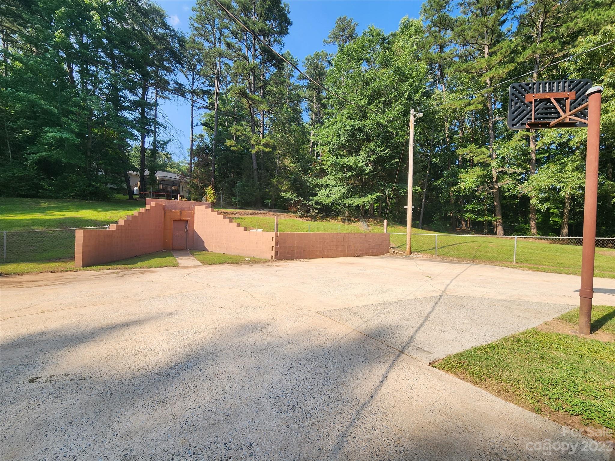 128 Devine Street Stanley, NC 28164 - Photo 8 of 36 a view of a basket ball ground