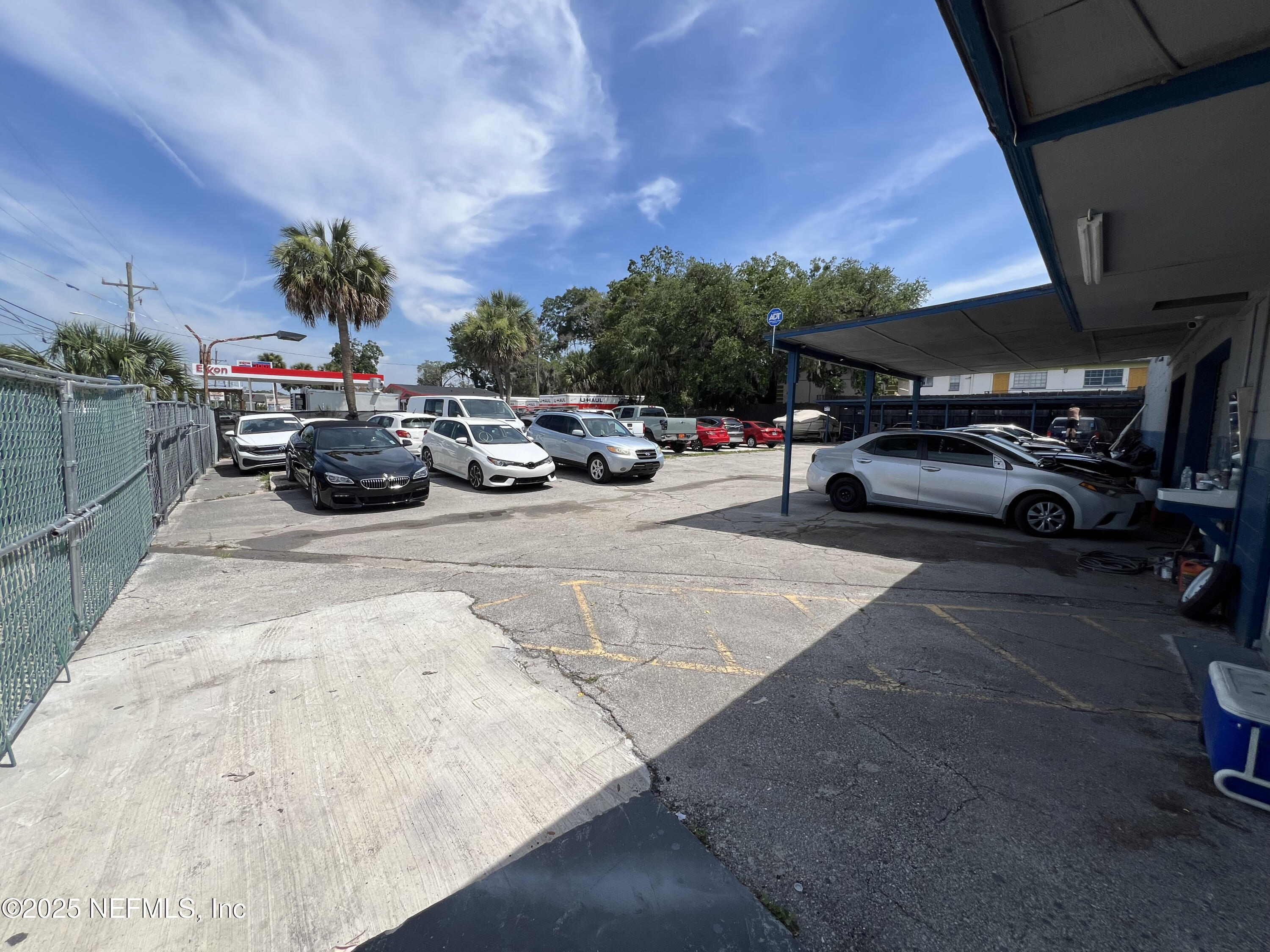 949 Arlington Road North Jacksonville, FL 32211 - Photo 18 of 25 a view of a cars park in front of a building