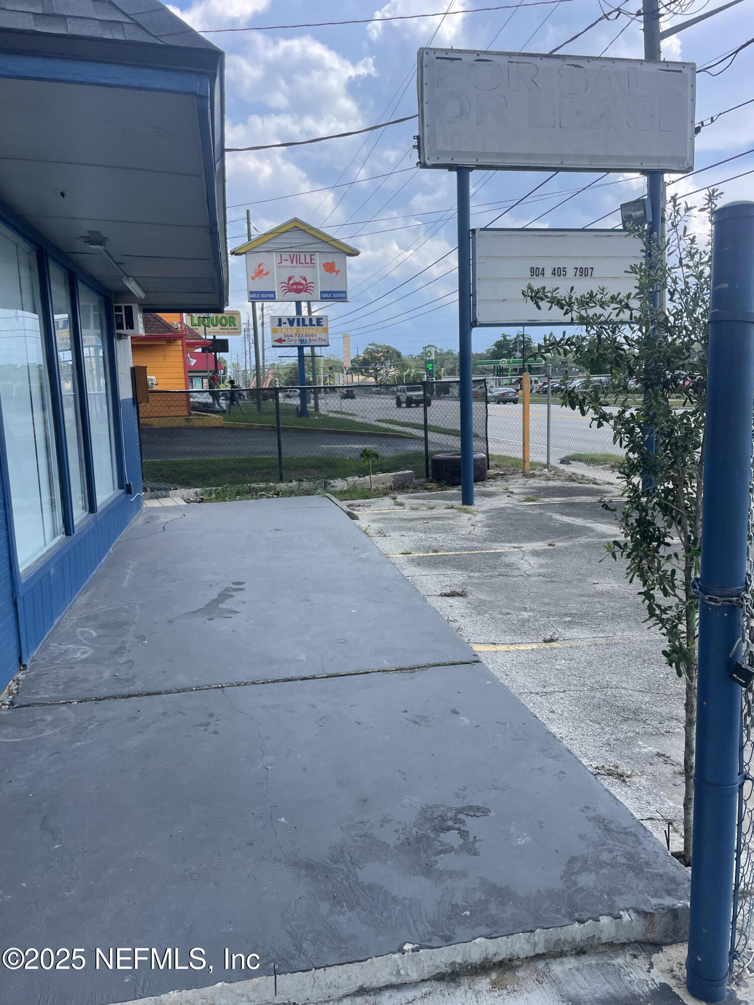 949 Arlington Road North Jacksonville, FL 32211 - Photo 19 of 25 a view of a yard with an outdoor space