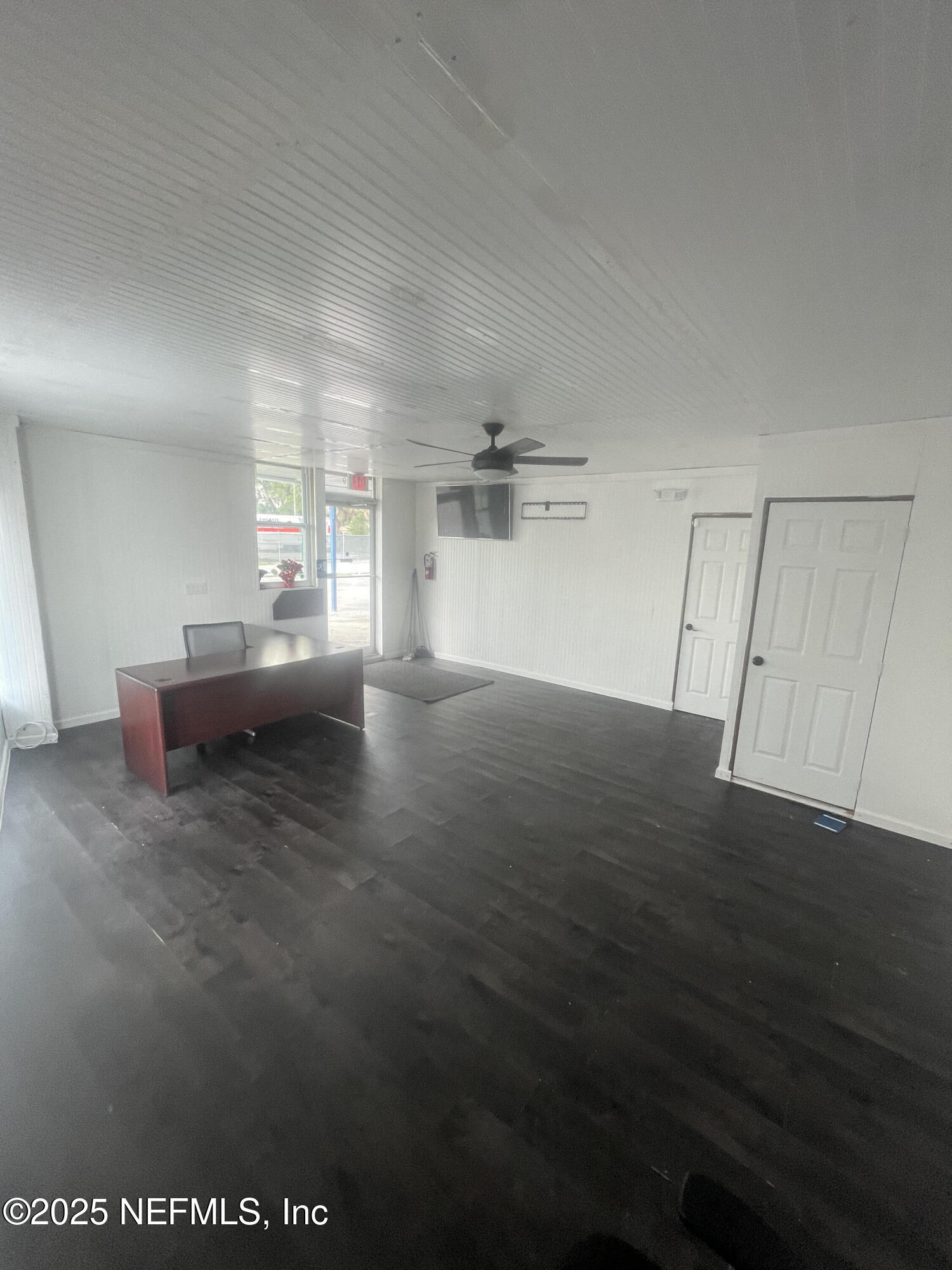 949 Arlington Road North Jacksonville, FL 32211 - Photo 22 of 25 a view of empty room with wooden floor