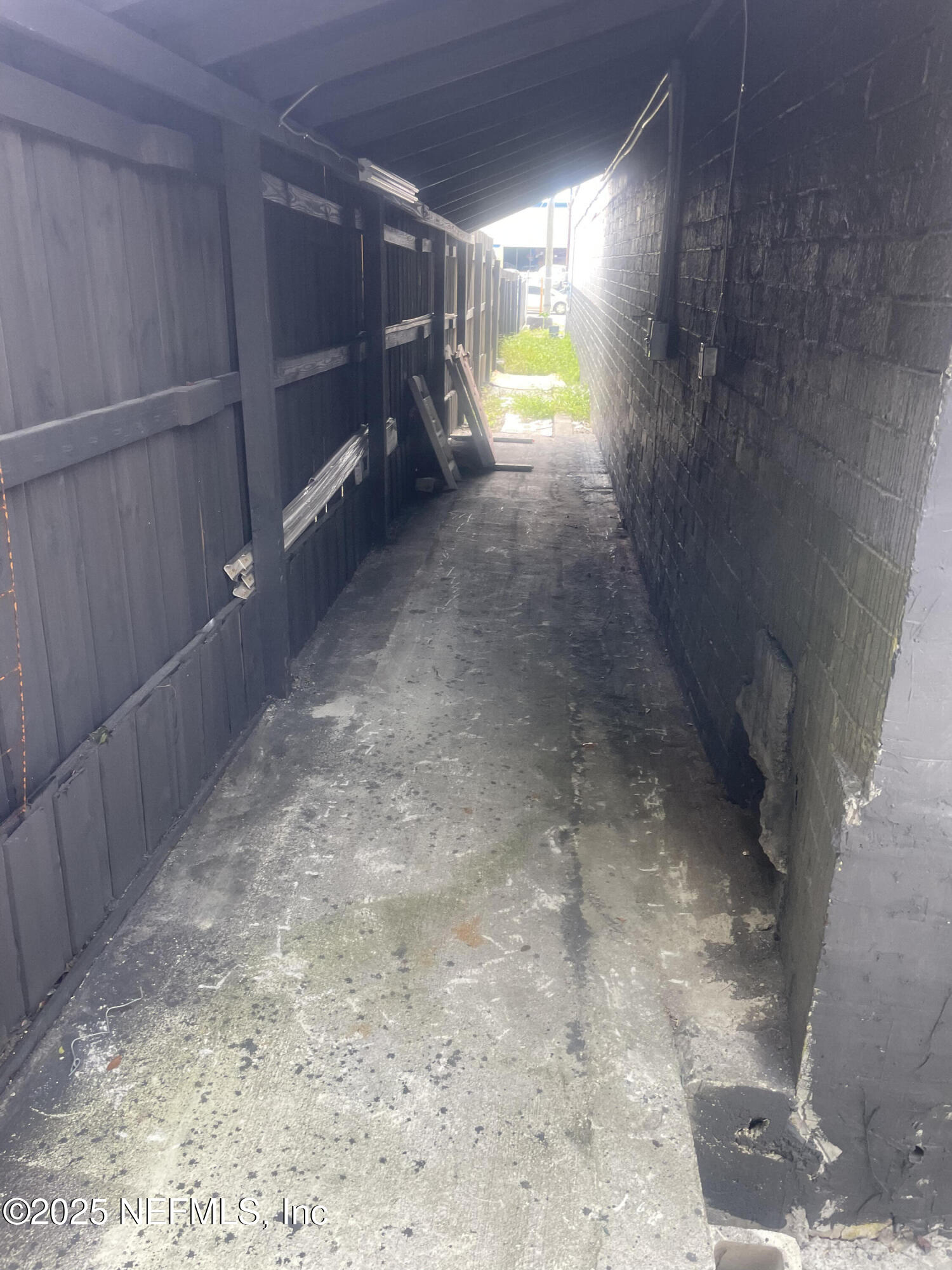 949 Arlington Road North Jacksonville, FL 32211 - Photo 25 of 25 a view of an empty room and a wooden floor