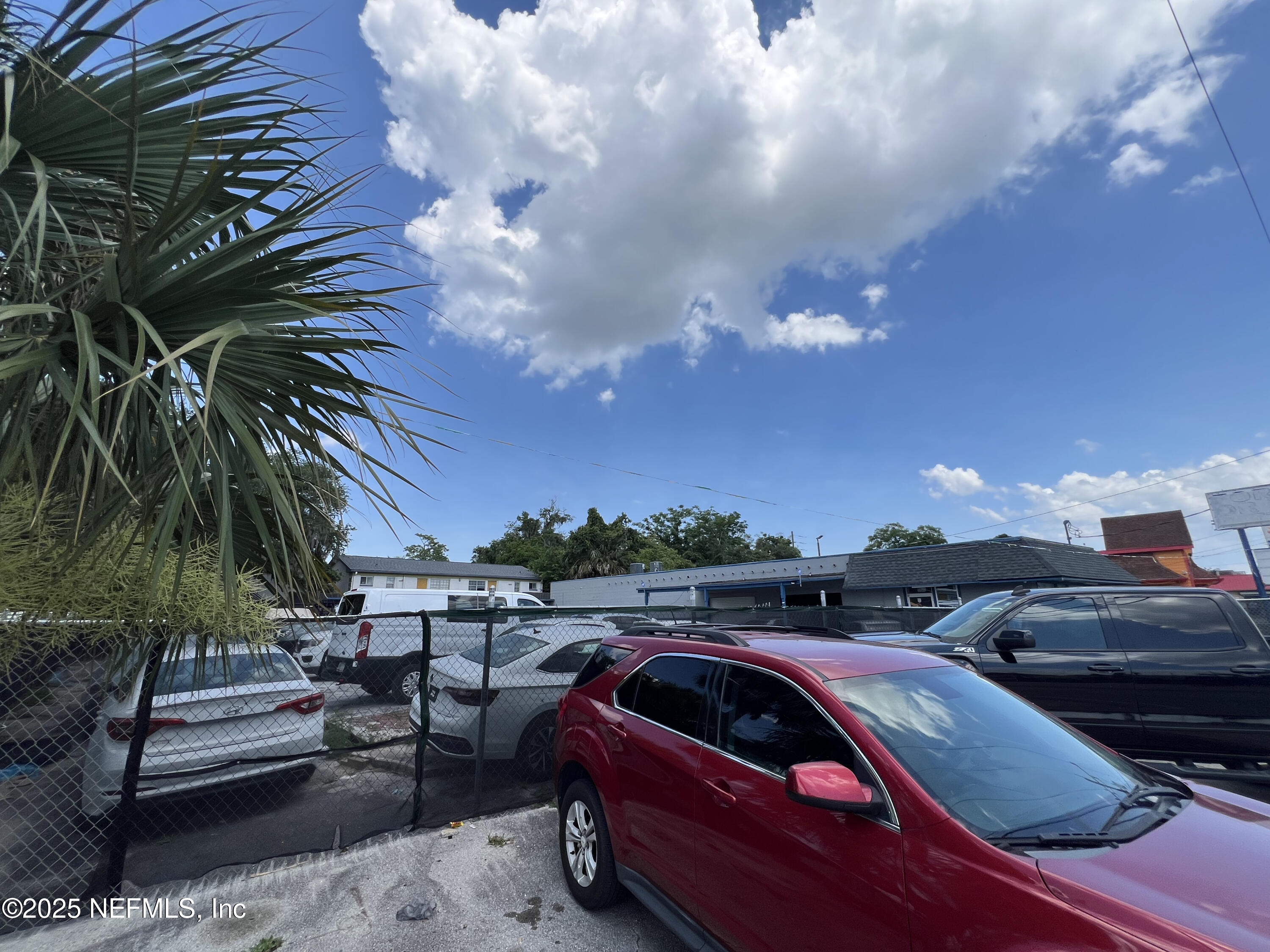 949 Arlington Road North Jacksonville, FL 32211 - Photo 7 of 25 a view of street with cars