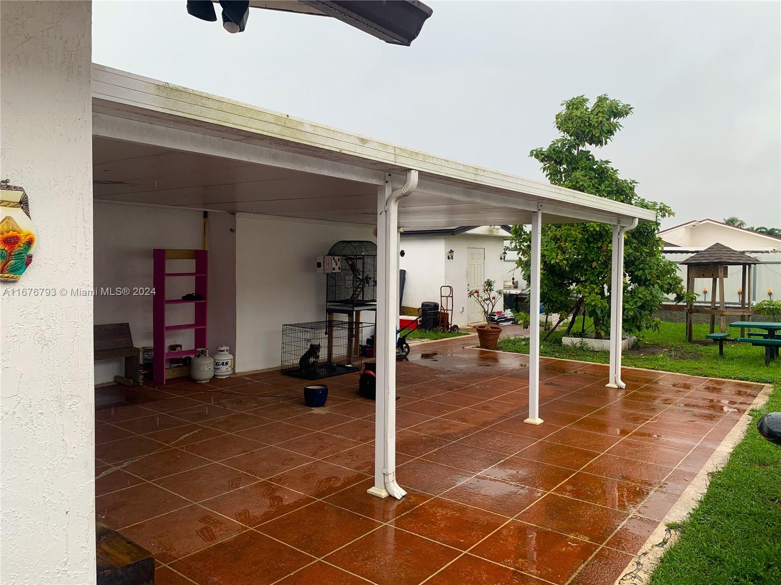 21048 Southwest 118th Place Miami, FL 33177 - Photo 14 of 26 a view of a room with gym equipment