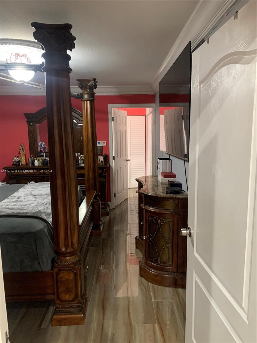 21048 Southwest 118th Place Miami, FL 33177 - Photo 19 of 26 a living room with furniture and a window