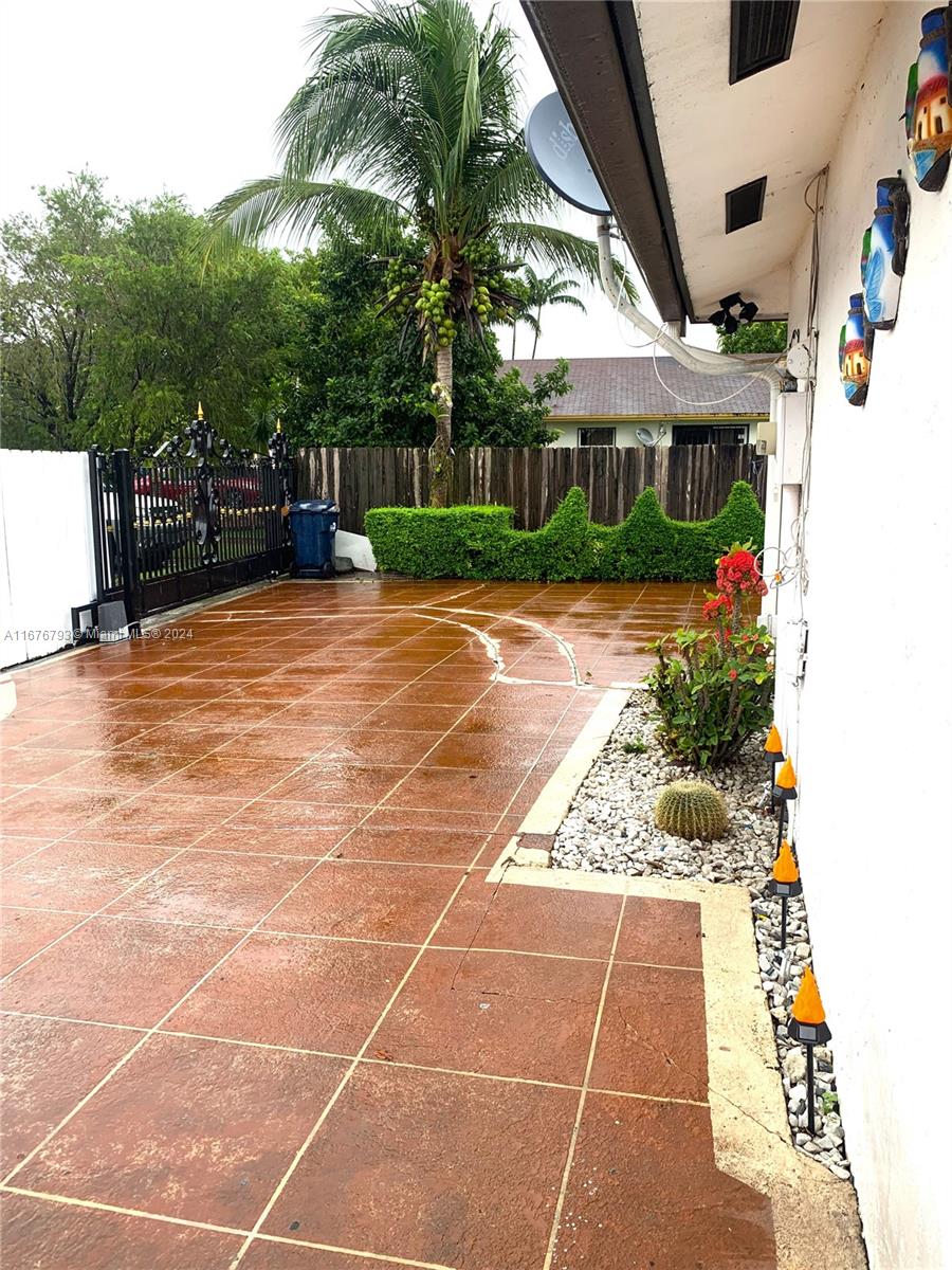 21048 Southwest 118th Place Miami, FL 33177 - Photo 3 of 26 a view of a basket ball ground