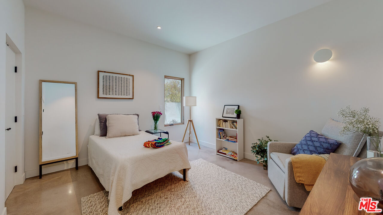 4865 Wicopee Street Los Angeles, CA 90041 - Photo 19 of 43 a bedroom with a bed and a couch