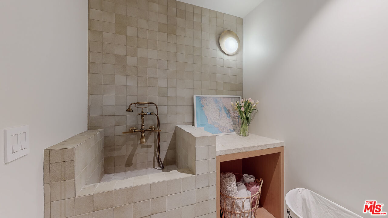4865 Wicopee Street Los Angeles, CA 90041 - Photo 30 of 43 a bathroom with a sink toilet and shower
