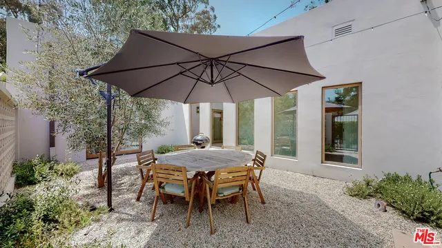 a table and chairs in patio
