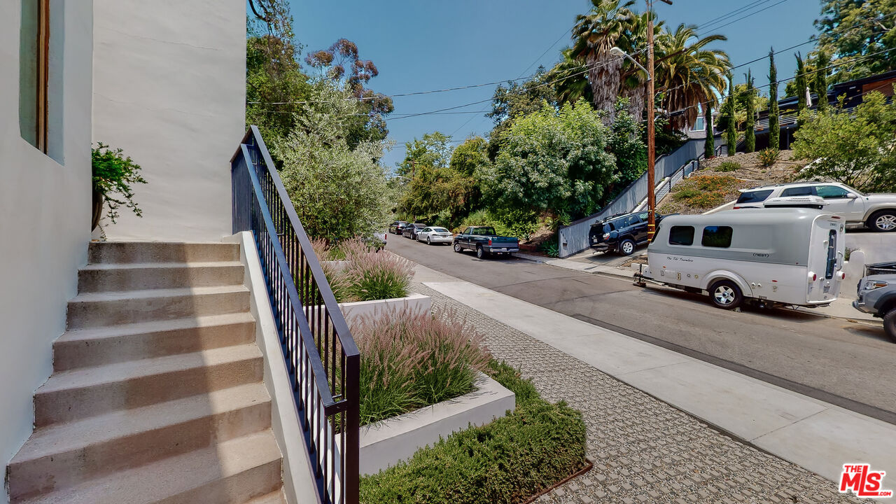 4865 Wicopee Street Los Angeles, CA 90041 - Photo 39 of 43 a view of a street with cars on road